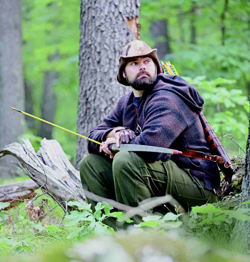 bowhunter in woods